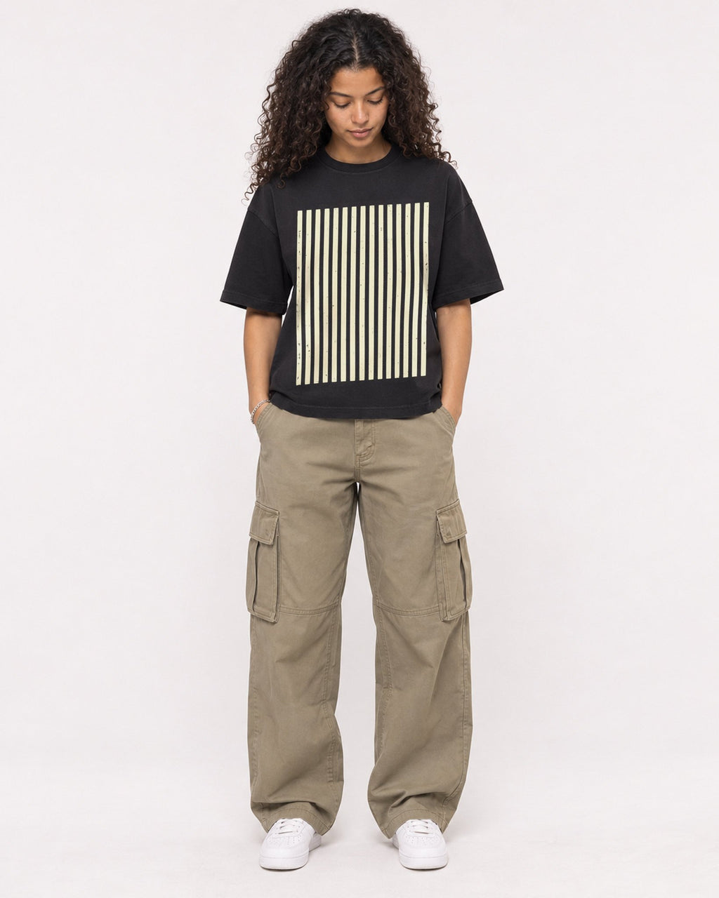 Mockup Boxy Heavyweight Tee Black female full-body 10