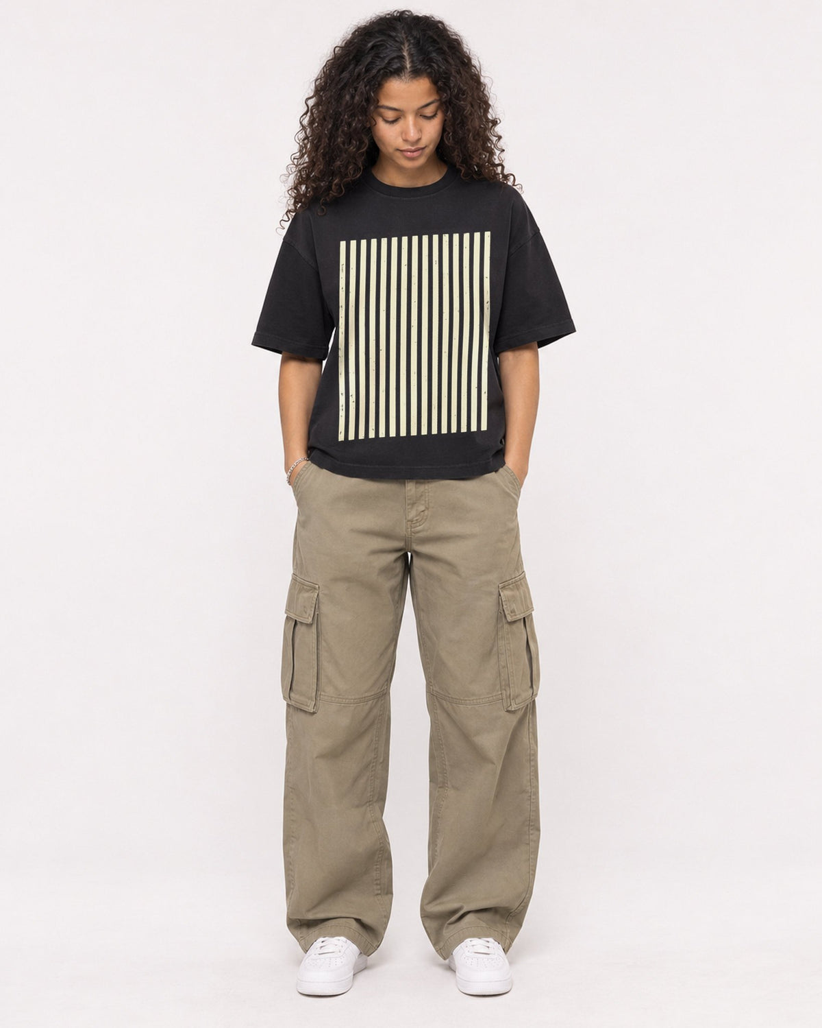 Mockup Boxy Heavyweight Tee Black female full-body 10