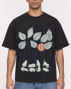 Mockup Boxy Heavyweight Tee Black male close-up 50