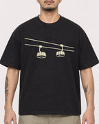 Mockup Boxy Heavyweight Tee Black male close-up 12