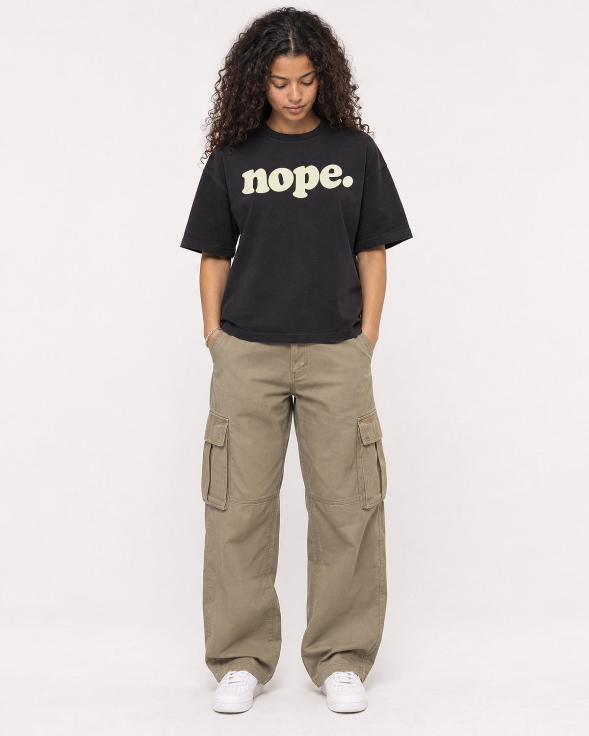 Mockup Boxy Heavyweight Tee Black female full-body 10