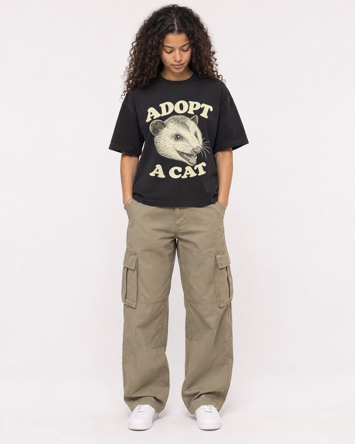 Mockup Boxy Heavyweight Tee Black female full-body 10