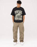 Mockup Boxy Heavyweight Tee Black male full-body 16