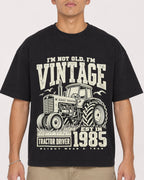 Mockup Boxy Heavyweight Tee Black male close-up 16
