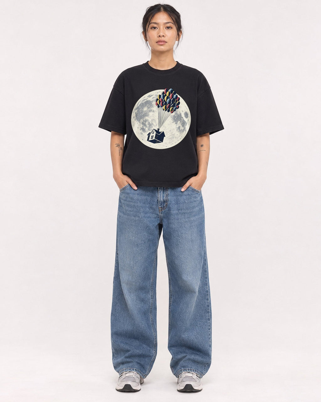 Mockup Boxy Heavyweight Tee Black female full-body 12