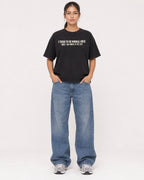 Mockup Boxy Heavyweight Tee Black female full-body 16