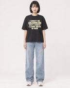 Mockup Boxy Heavyweight Tee Black female full-body 11