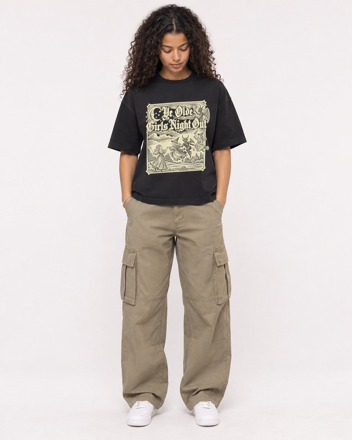 Mockup Boxy Heavyweight Tee Black female full-body 10