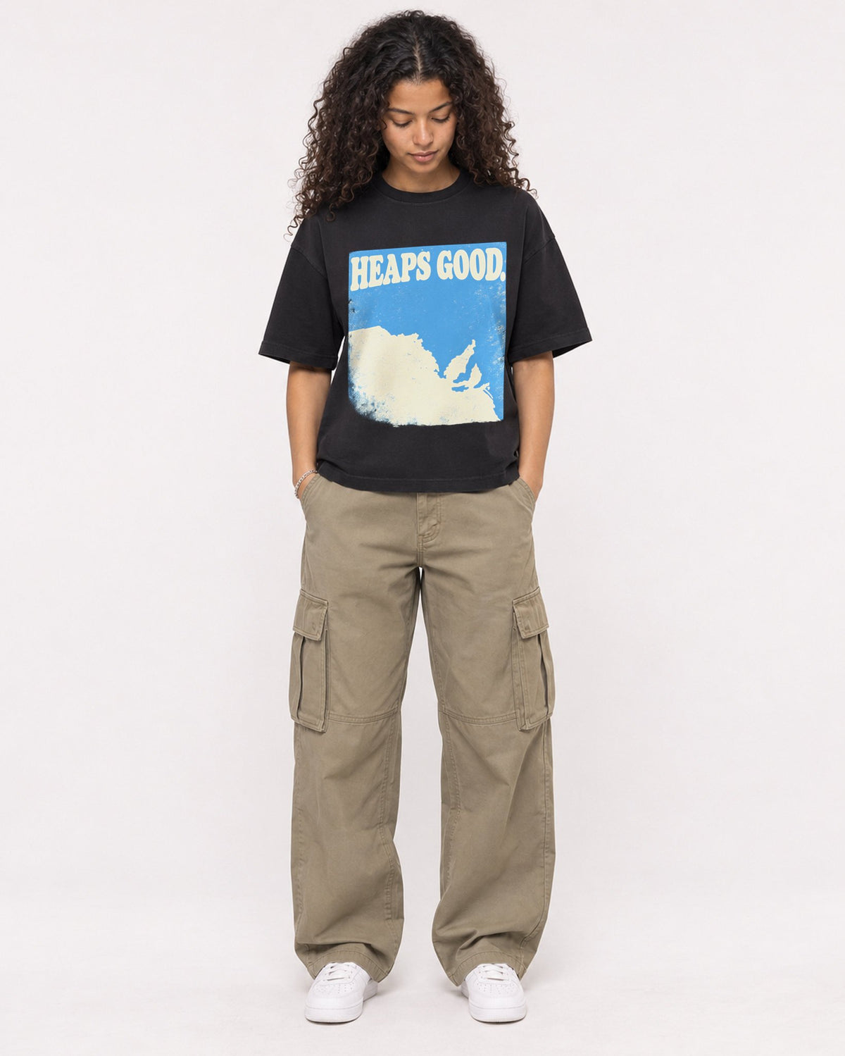 Mockup Boxy Heavyweight Tee Black female full-body 10