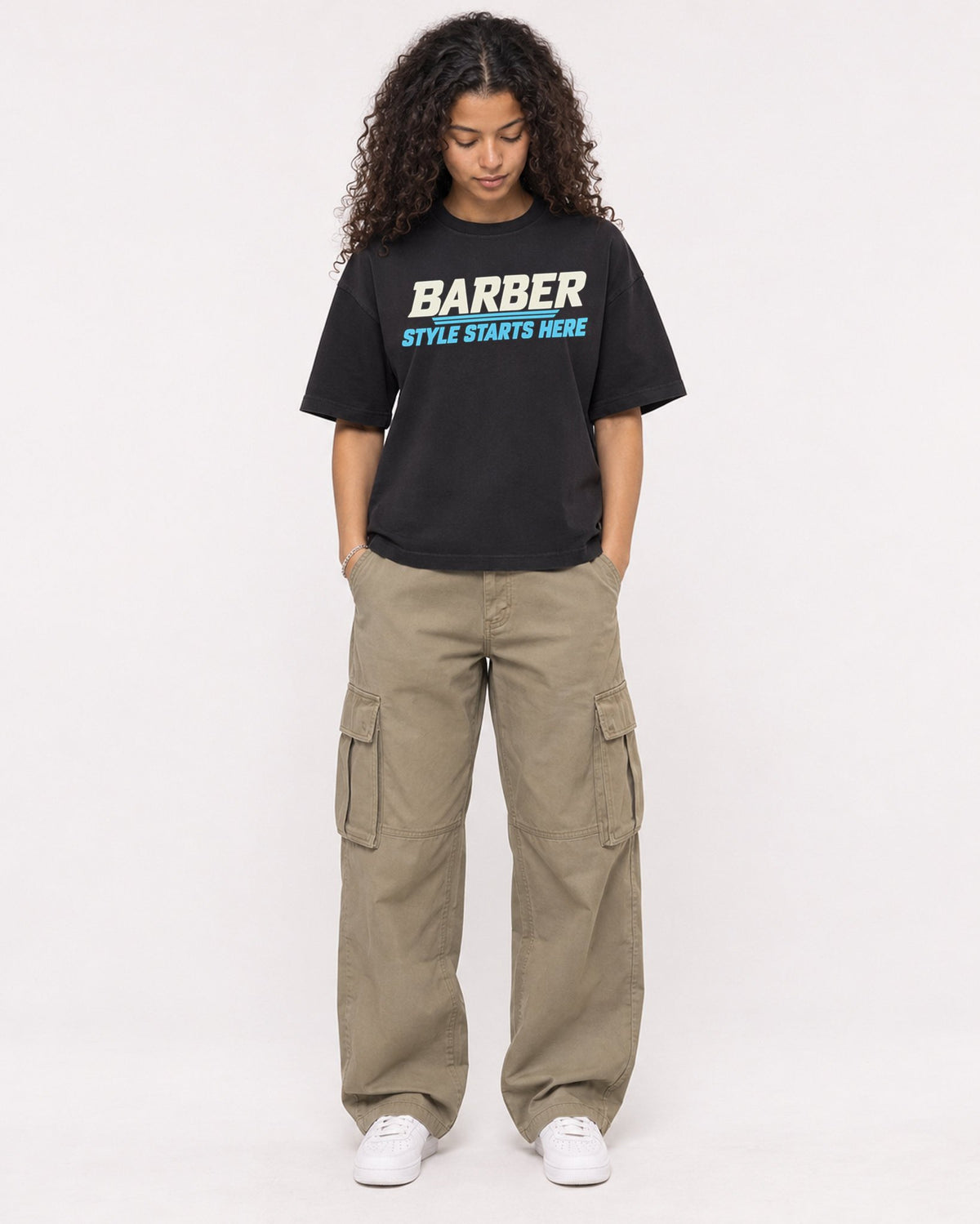 Mockup Boxy Heavyweight Tee Black female full-body 10