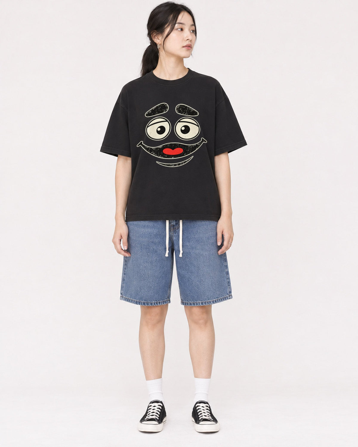 Mockup Boxy Heavyweight Tee Black female full-body 21