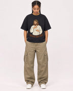 Mockup Boxy Heavyweight Tee Black female full-body 50
