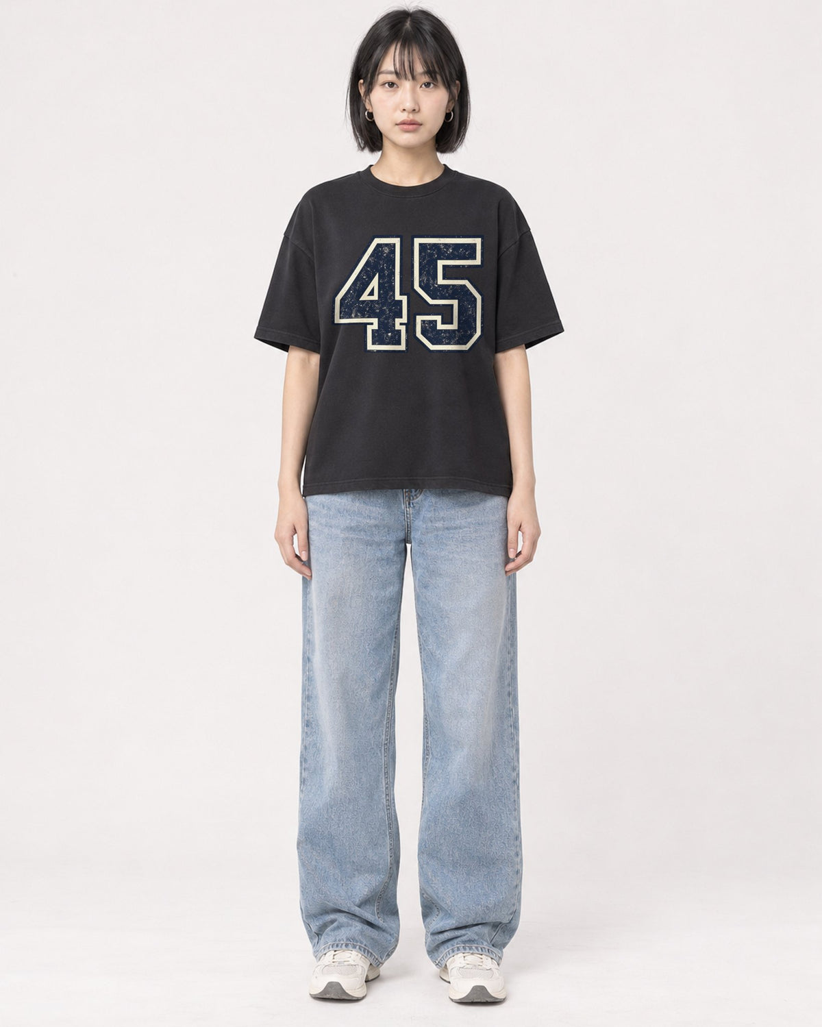 Mockup Boxy Heavyweight Tee Black female full-body 11