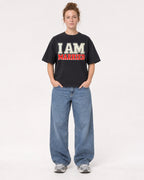 Mockup Boxy Heavyweight Tee Black female full-body 28