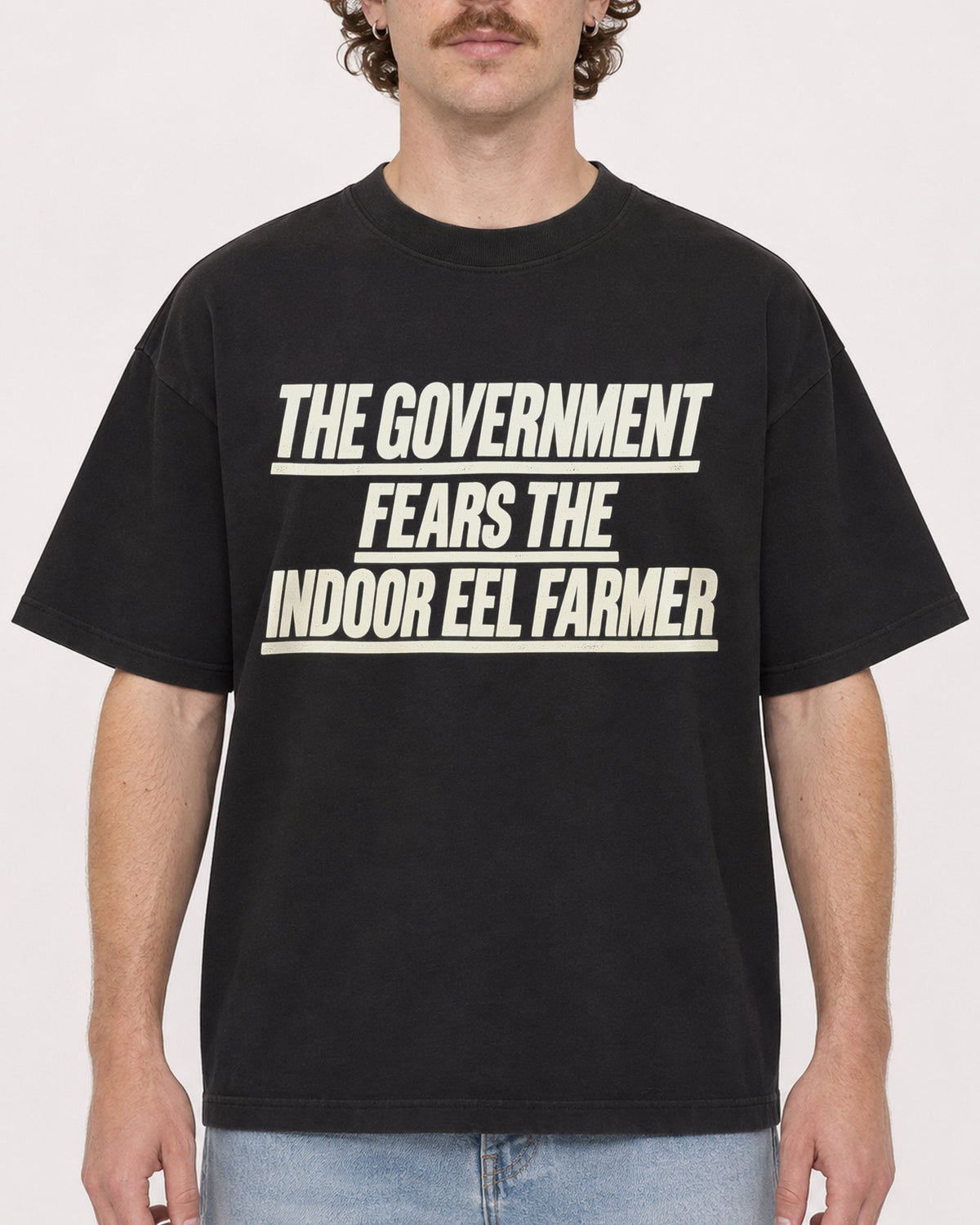 Mockup Boxy Heavyweight Tee Black male close-up 09