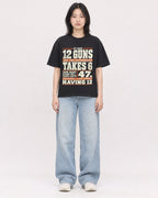 Mockup Boxy Heavyweight Tee Black female full-body 31