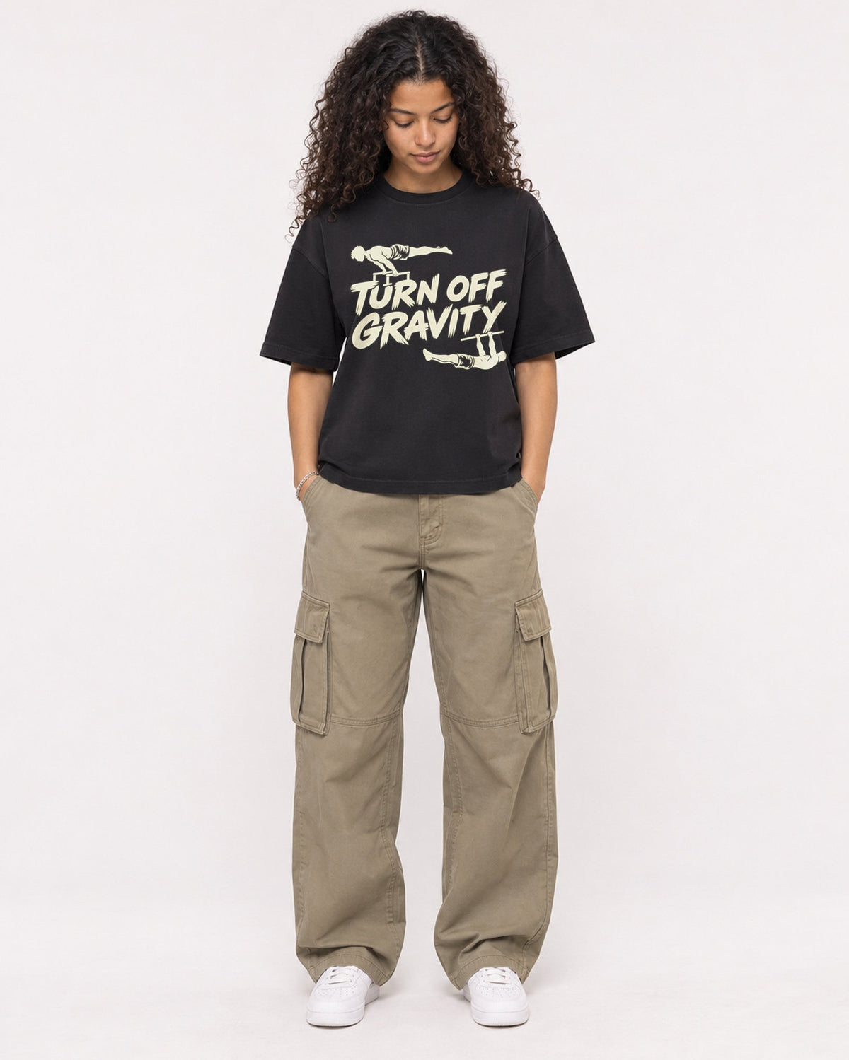 Mockup Boxy Heavyweight Tee Black female full-body 10