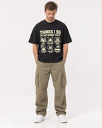 Mockup Boxy Heavyweight Tee Black male full-body 08