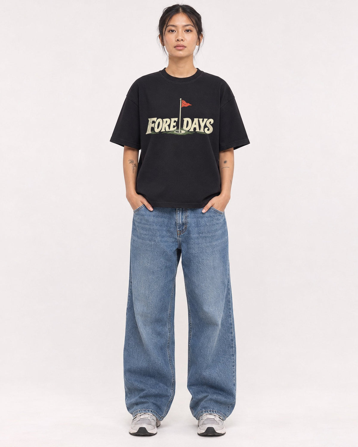Mockup Boxy Heavyweight Tee Black female full-body 12