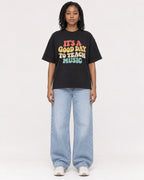 Mockup Boxy Heavyweight Tee Black female full-body 15