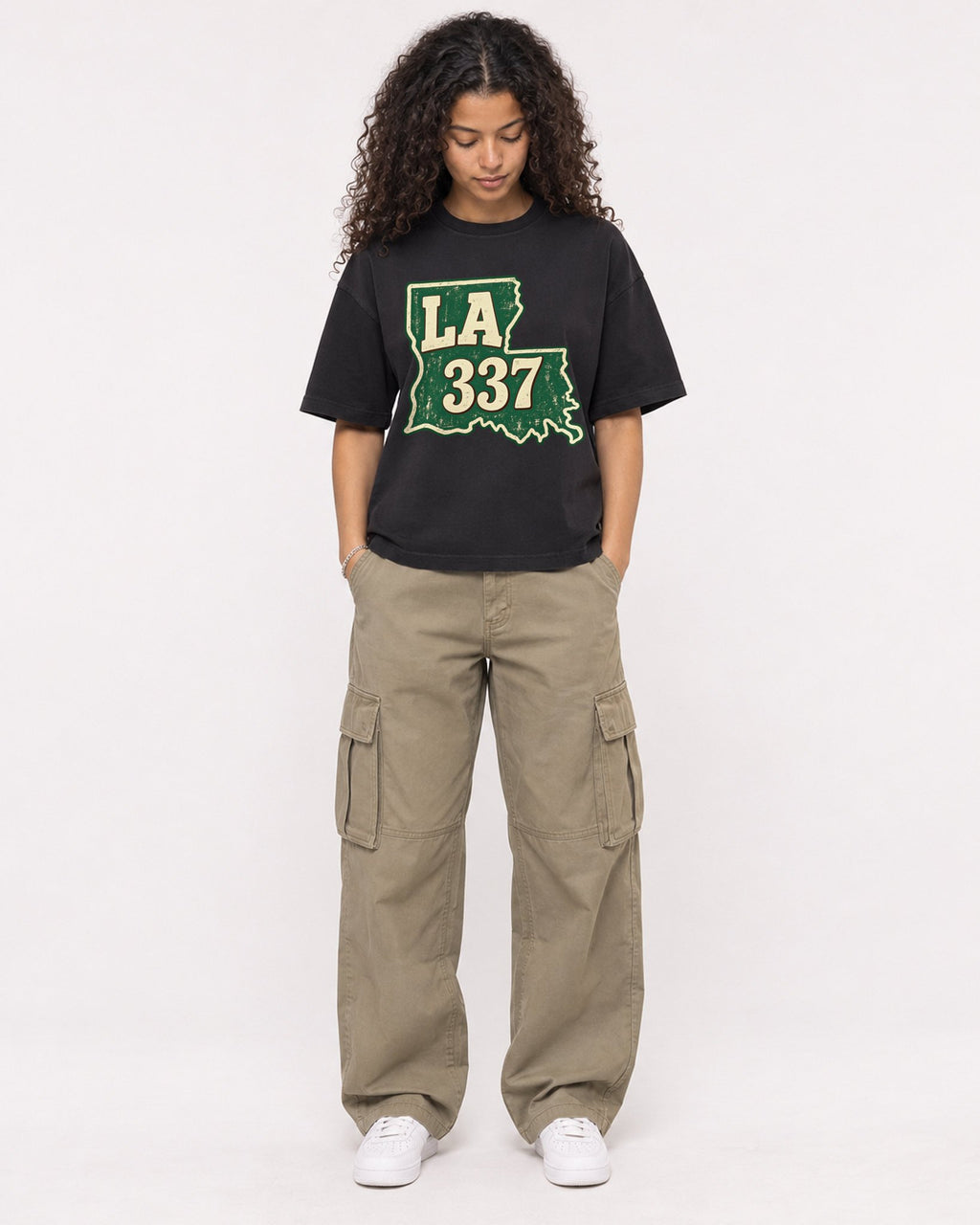 Mockup Boxy Heavyweight Tee Black female full-body 10