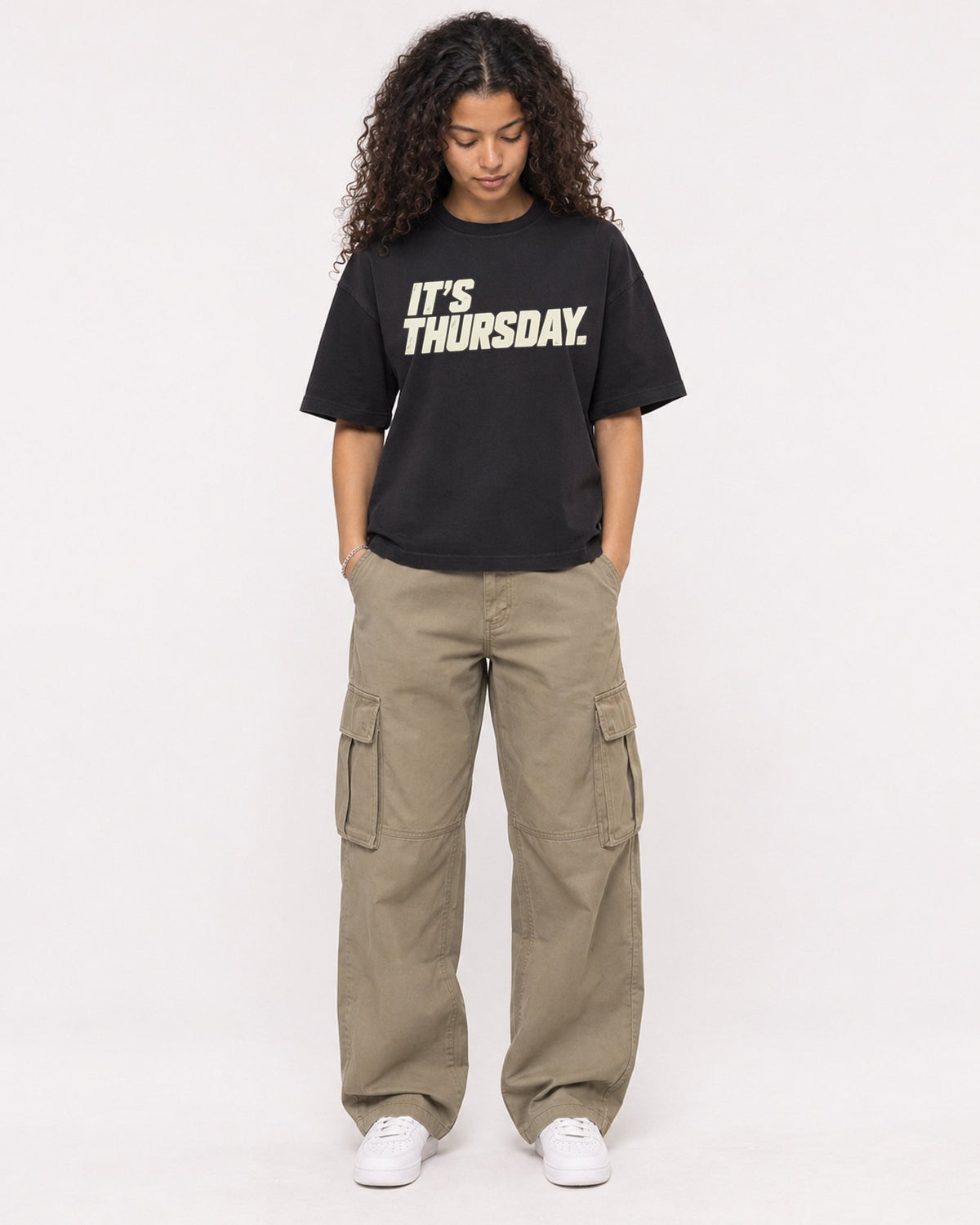 Mockup Boxy Heavyweight Tee Black female full-body 10