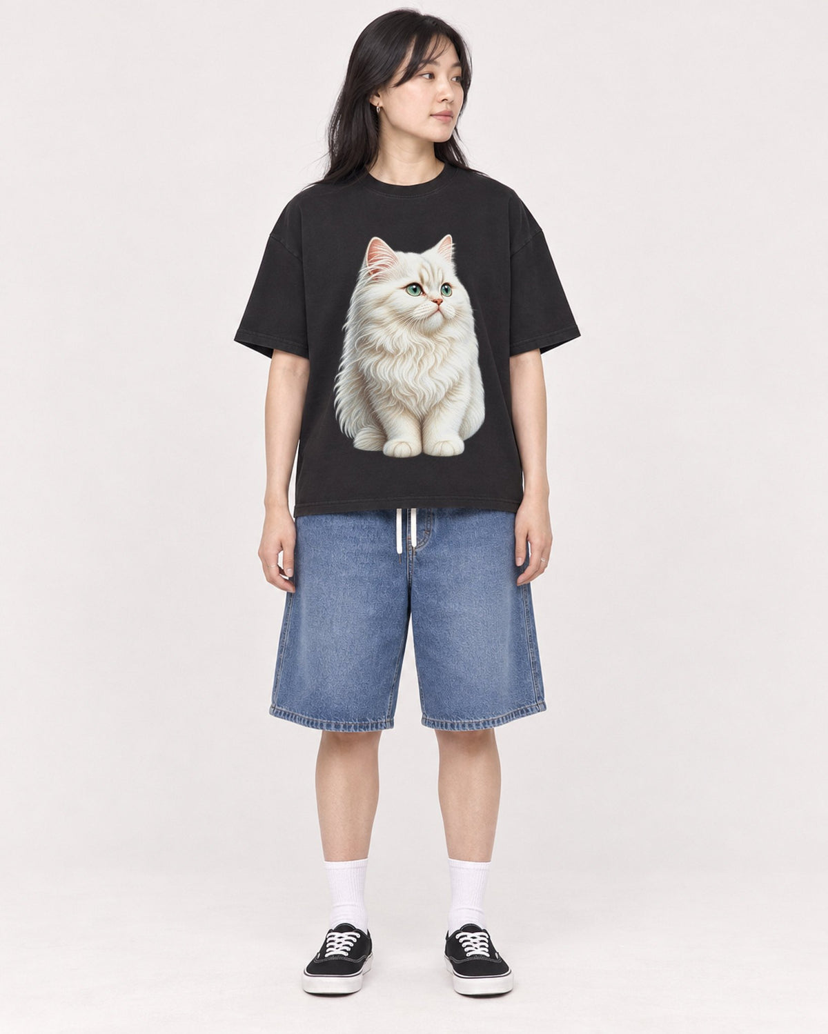 Mockup Boxy Heavyweight Tee Black female full-body 13