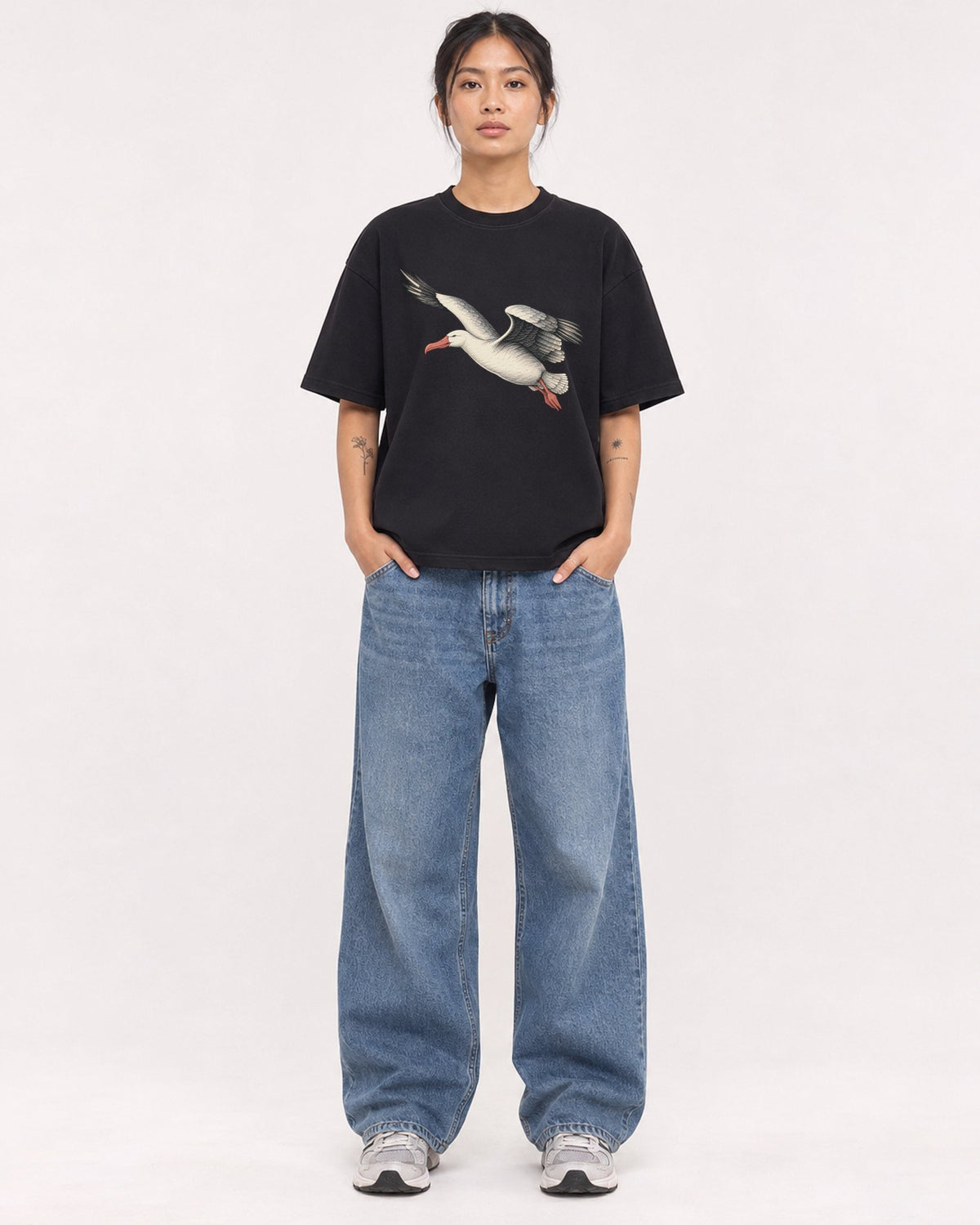 Mockup Boxy Heavyweight Tee Black female full-body 12