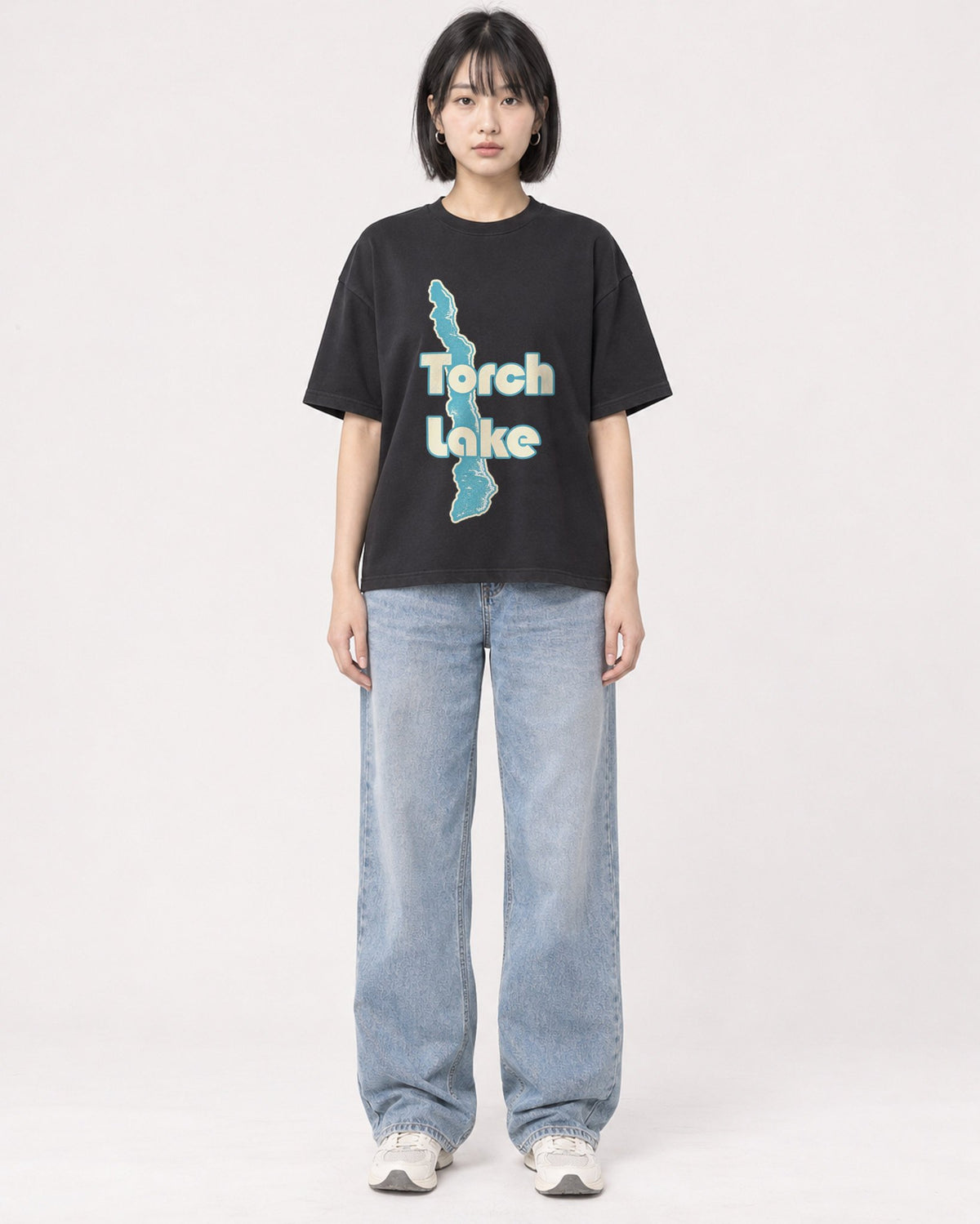 Mockup Boxy Heavyweight Tee Black female full-body 11