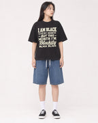 Mockup Boxy Heavyweight Tee Black female full-body 01