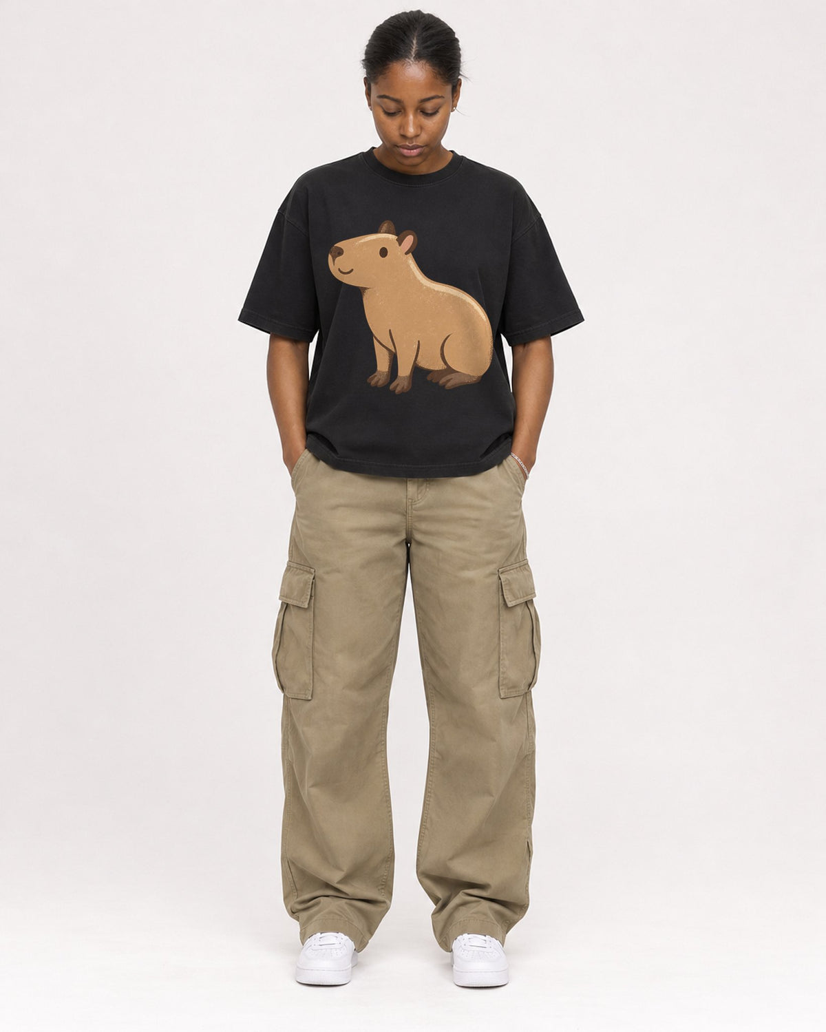 Mockup Boxy Heavyweight Tee Black female full-body 34